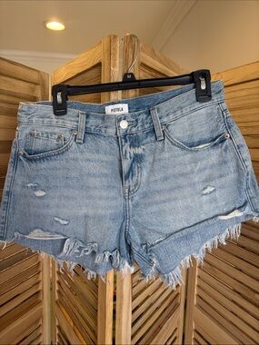 Pistola Light Wash Distressed Denim Cutoff Shorts.